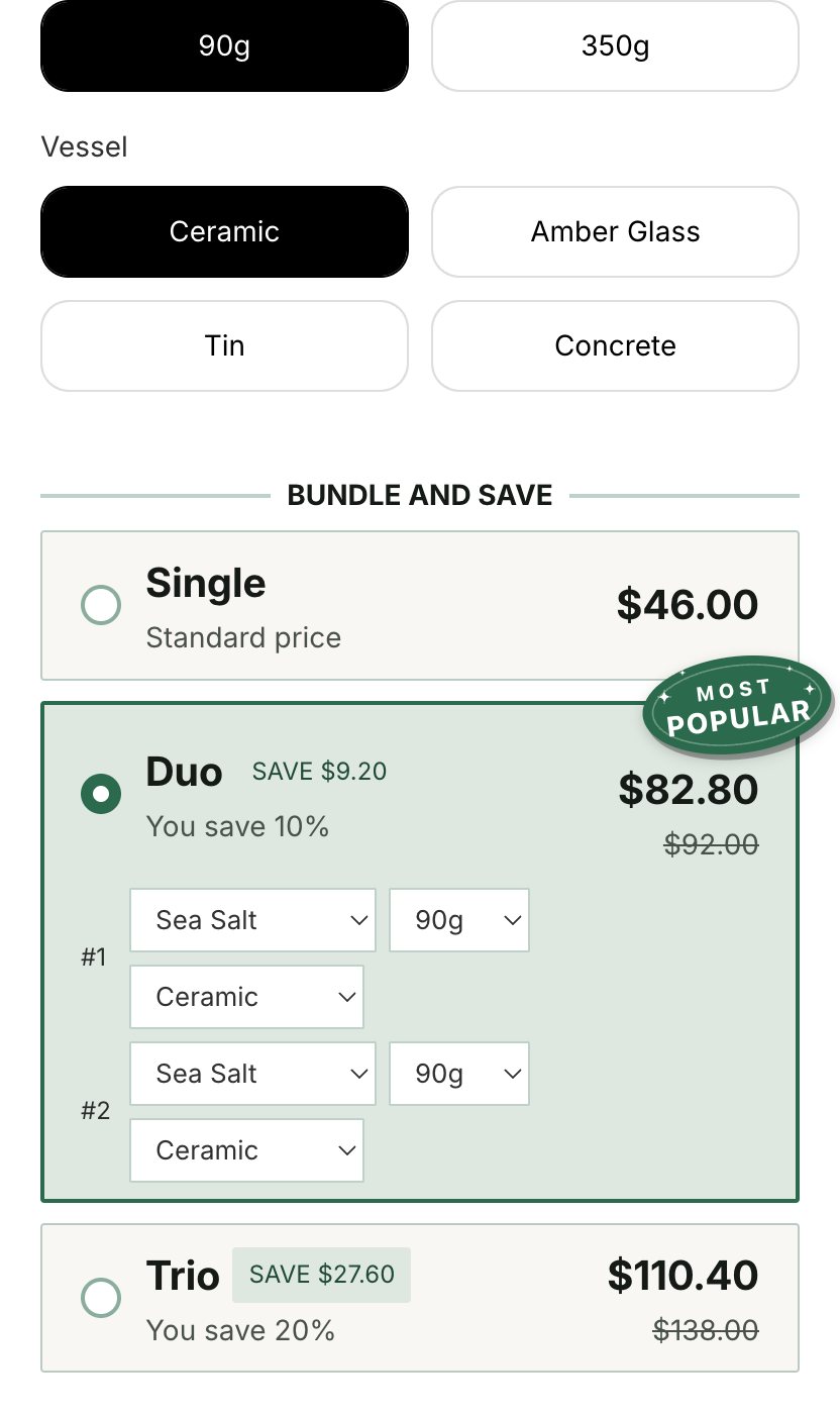 A product page on a development store in grayscale, with the TreStack Bundles widget in green and paper colours: Single at 46 dollars, Duo at 82.80 dollars with a Most popular badge and a variant picker for each candle, and Trio at 110.40 dollars
